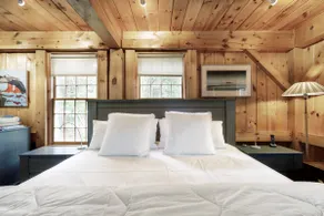 Get Cozy Under the Rustic Beams at a Woodland Hideaway - Image 5
