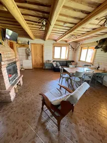 Cabin house surrounded by deers and forest - Image 4