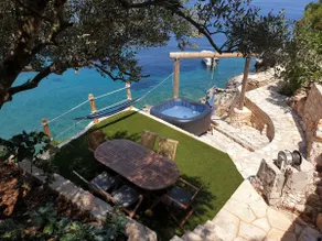 Remote beach house, just above the sea. - Image 3