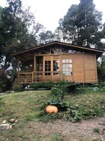 A nice cabin with a garden. - Image 5