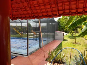 A vacation home with a pool and a hot tub - Image 5