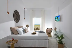Stroll barefoot to the beach from a boho tiny home - Image 4