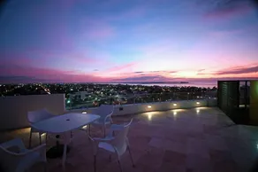 View of the bay, swimming pool, and whirlpool. - Image 2