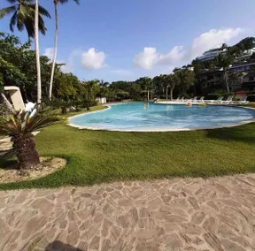Beachfront Apartment with Pool and Private Garden - Image 3