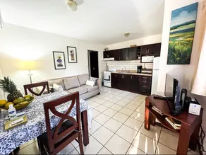 Apartment surrounded by beautiful gardens and a pool - Image 2
