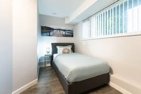 3BR Private & Convenient Garden Level Suite - Image 5