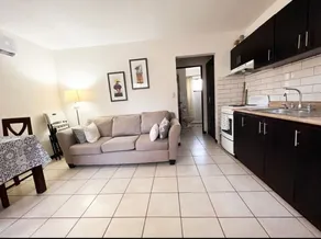 Apartment surrounded by beautiful gardens and a pool - Image 3