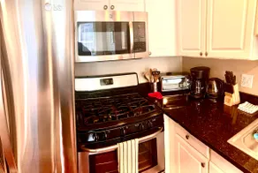 Charming South-End condo with large outdoor patio - Image 2
