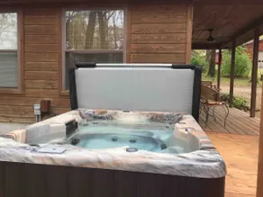 “Judy’s Cozy Cabin”. Hot tub - Image 3