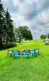 Experience the charm of a rustic lakefront cottage, perfect for year-round fun! - Image 3