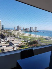 In front of Playa Cavancha, Marina Golf Building - Image 5