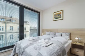 Apartments Kraków Rajska 3 by Noclegi Renters - Image 2