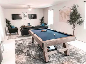 A Home in One! Game Room & Tesla Charger! - Image 5