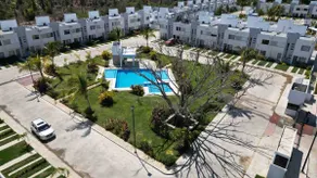 A vacation home with a pool and beach club - Image 2