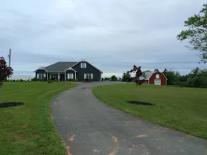 3 bedroom home/attached fully equipped in-lawsuit - Image 2