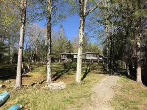 Lakefront Mid-Century Modern 4 Bedroom Home - Image 2