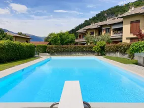 Relax in the green with pool a few steps from lake - Image 2