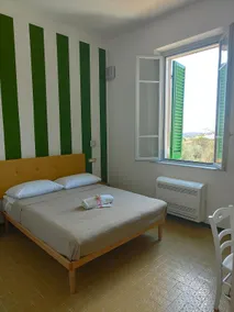 Room with two bedrooms and one bathroom - Image 3