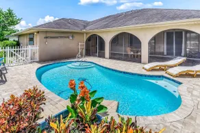 Blissful Waterfront Haven with Heated Pool - Image 2