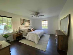 Spacious family home in quiet wooded neighborhood - Image 4