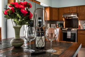 Cozy 3-Bed 2-Bath Condo | Parking and Laundry! - Image 2
