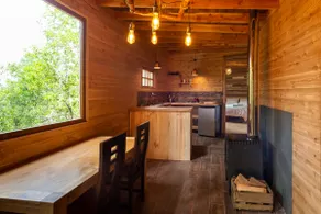 A cozy cabaña in the forest - Image 4