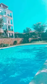 Sunny apartment with pool and sunset view - Image 2