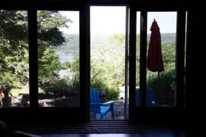 Peaceful studio apartment with lake views. - Image 4