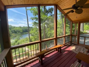 Secluded Waterfront Cabin on hiking trails! Lake on one side river on the other. - Image 3