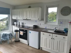 Beautiful one bedroom apartment with uninterrupted ocean views and on site parking - Image 3