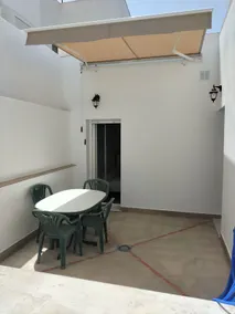 Apartamentos de Dora, House with a double bed and a sofa. - Image 2