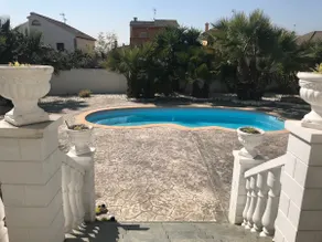 A villa with a swimming pool and a 1,200-square-meter private garden. - Image 4