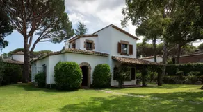 A villa with a large garden and a porch · Golf Costa Brava - Image 2