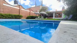 House in a subdivision with a pool and heating - Image 2
