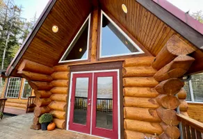 A cozy, romantic lake view log cabin with hot tub & wood burning fireplace. - Image 2