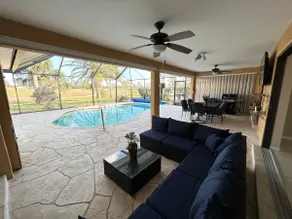 Sunny Florida Retreat 3BR, 2BA Heated Pool - Image 3
