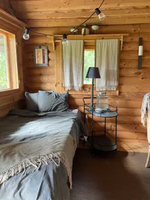 Cabin in a beautiful location by a pond with a view to the west. - Image 4