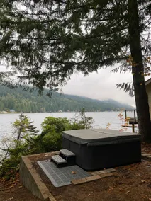 Cozy MCM Lake Retreat with Sauna, Hot Tub & Views - Image 4