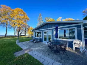 Lakefront Cottage with Private Beach - Image 4