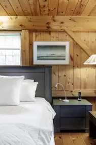Get Cozy Under the Rustic Beams at a Woodland Hideaway - Image 2