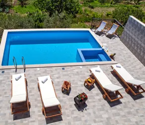 Cozy house Duje with heated pool and jacuzzi - Image 4