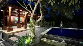 Pujis Homestay with a private pool and garden view - Image 3