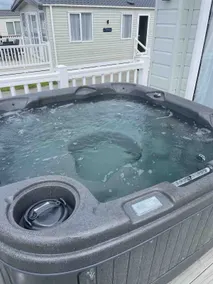 Bumble Retreat-From Coast to Comfort with Hot Tub - Image 3