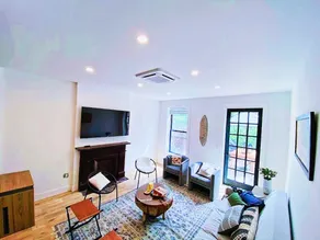 Urban Serenity, Harlem Brownstone Duplex w/ Patio - Image 2
