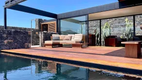 Wake up to nature in this modern glass house - Image 5