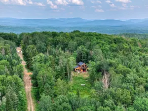 Mountain chalet, hot tub, private property, and lake - Image 2