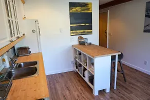Cozy Creekside Two-Storey Condo - Image 5