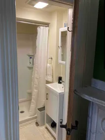 Enchanting efficiency with kitchenette and bath - Image 2