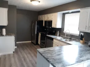 This homes is just 4 short miles from campus. - Image 4