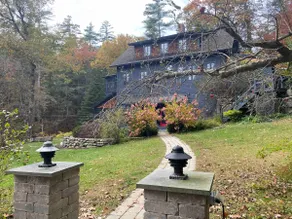Cottage beside a waterfall - Image 2